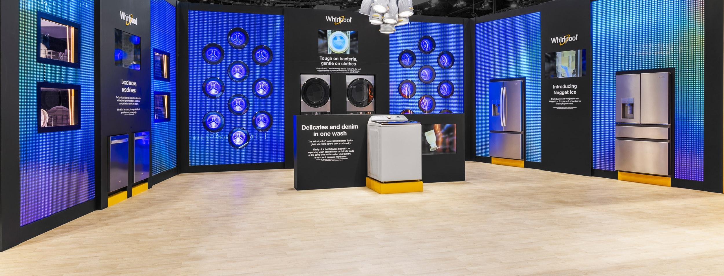 LED walls with washer drums and Whirlpool appliances in the Whirlpool booth at KBIS